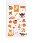 Sheet of orange-themed stickers on a white background