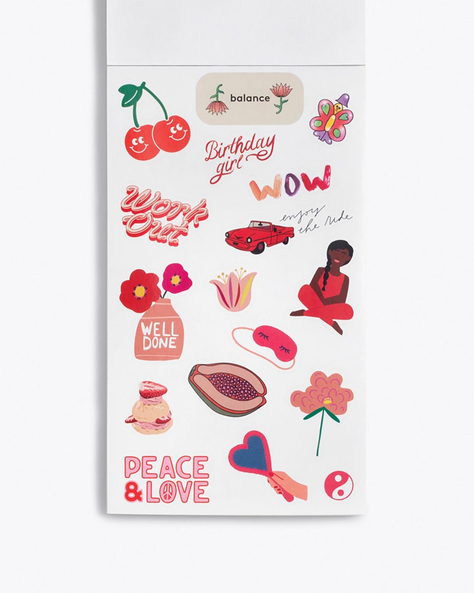Sheet of stickers with various designs including text and illustrations on a white background