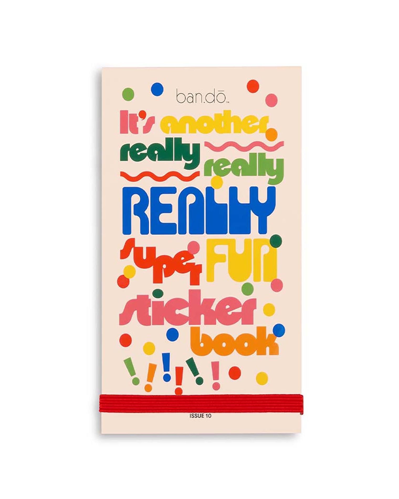 Sticker book with colorful text and ban.do branding on a beige background