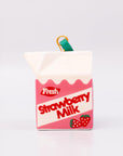 Strawberry milk carton-shaped ornament on a white background