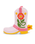 Pink cowboy boot vase with floral design on a white background