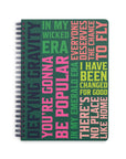 green mini notebook with colorful wicked text