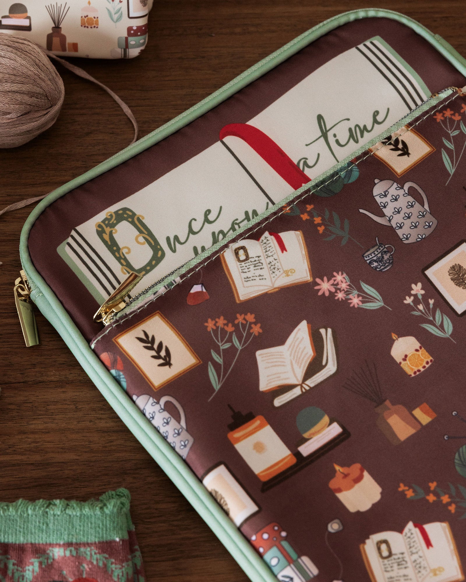 brown book sleeve with colorful cozy book nook icons