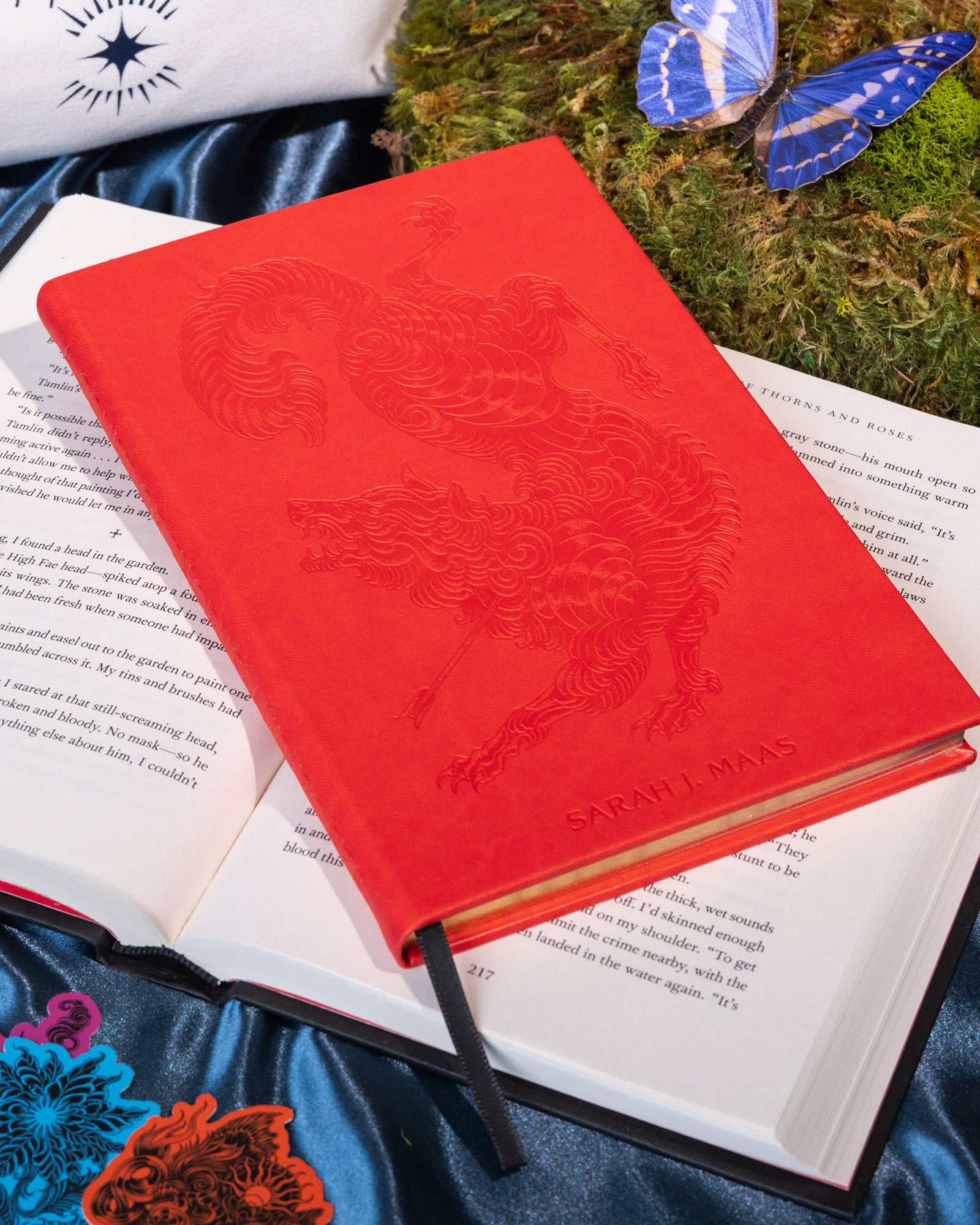 Red notebook with a wolf design on a blue background