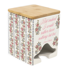 Decorative kitchen stool with floral pattern and wooden top on a white background