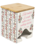 Decorative kitchen stool with floral pattern and wooden top on a white background