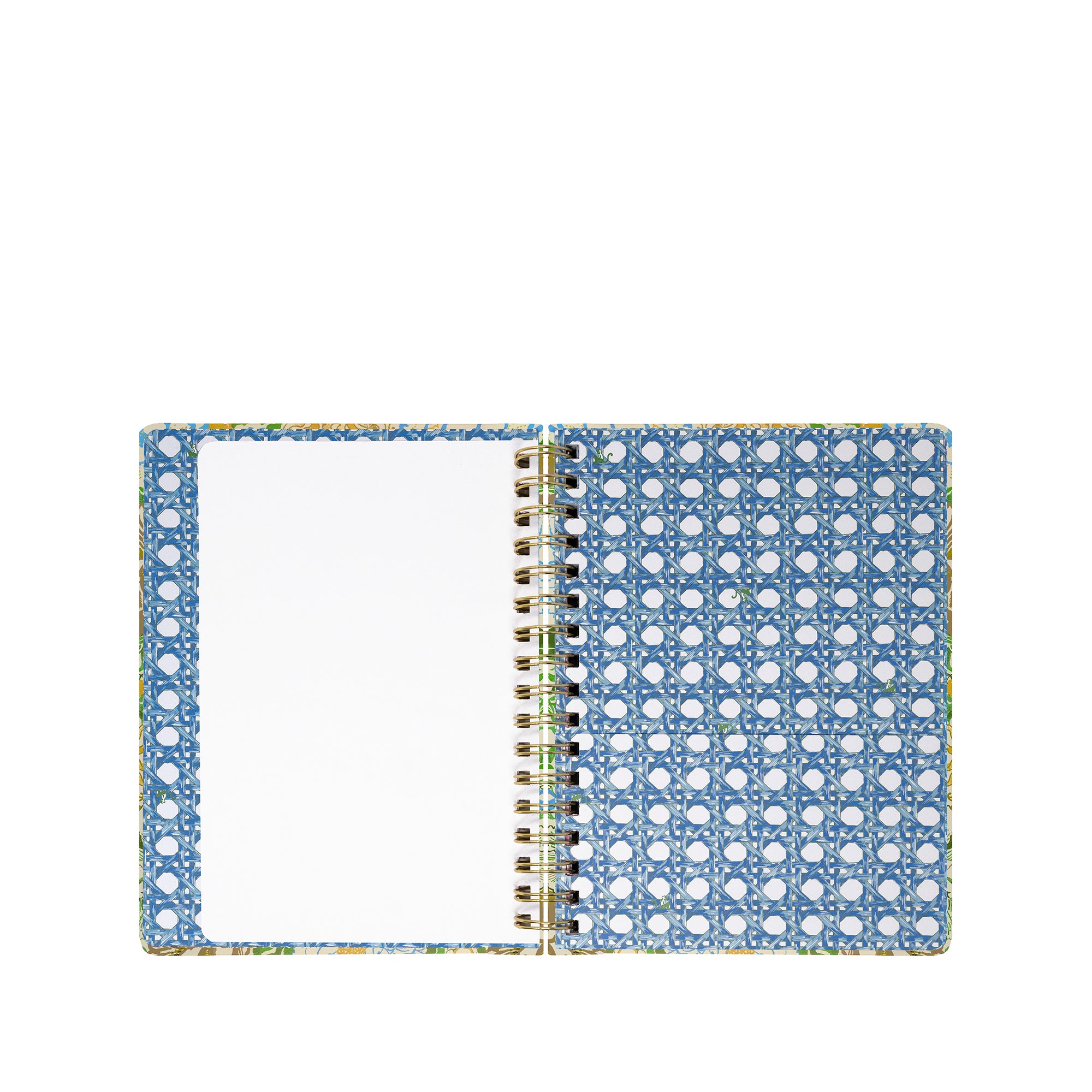 Open planner with blue and white polka dot cover on a white background