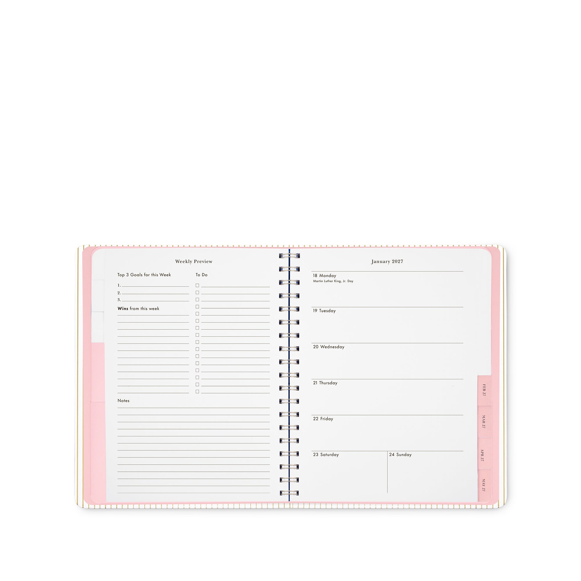 An open spiral-bound weekly planner page with pink and white pages, shown on a clean white background.