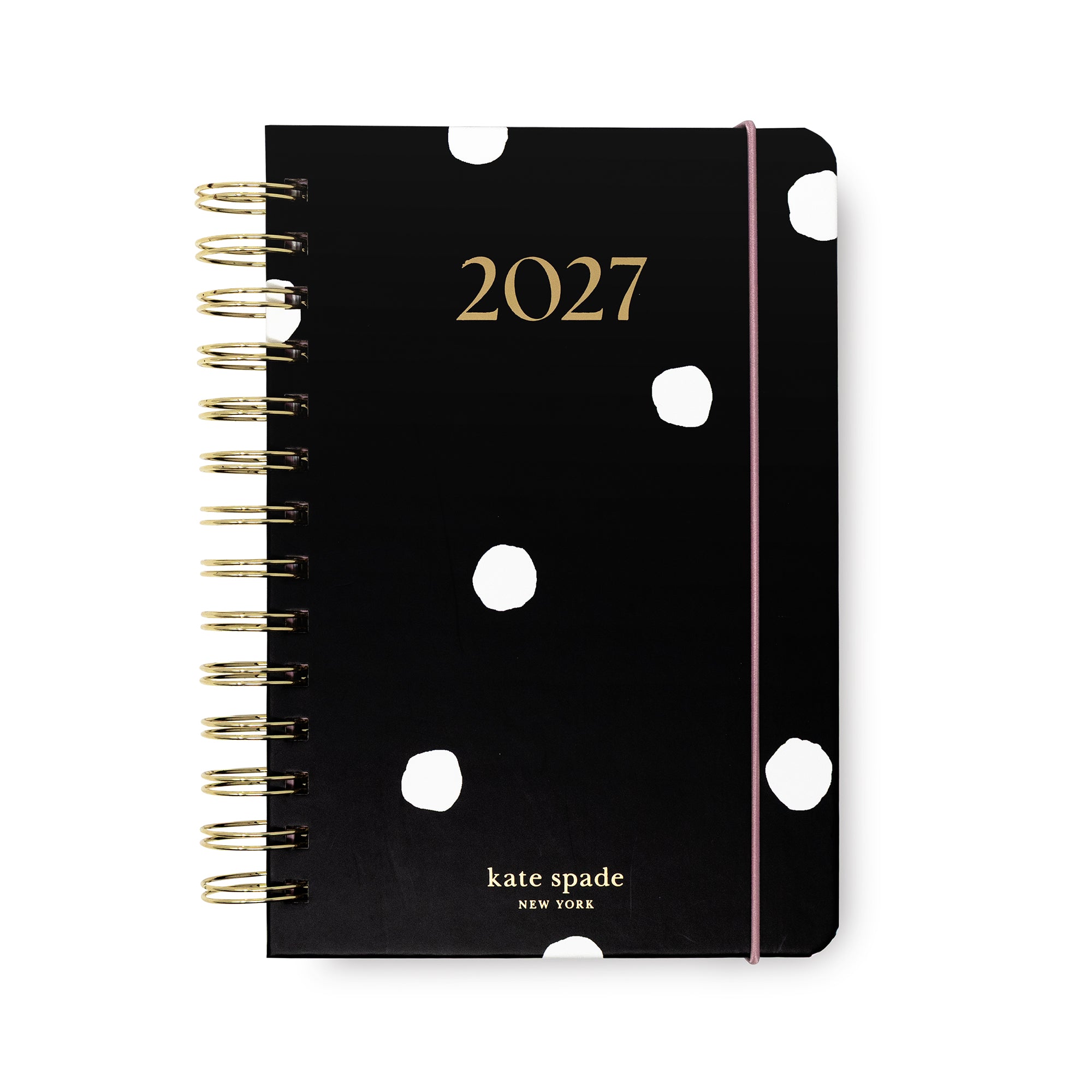 Kate Spade 2027 spiral-bound planner in black with white polka dots, gold lettering, and a pink elastic closure band, shown on a white background.
