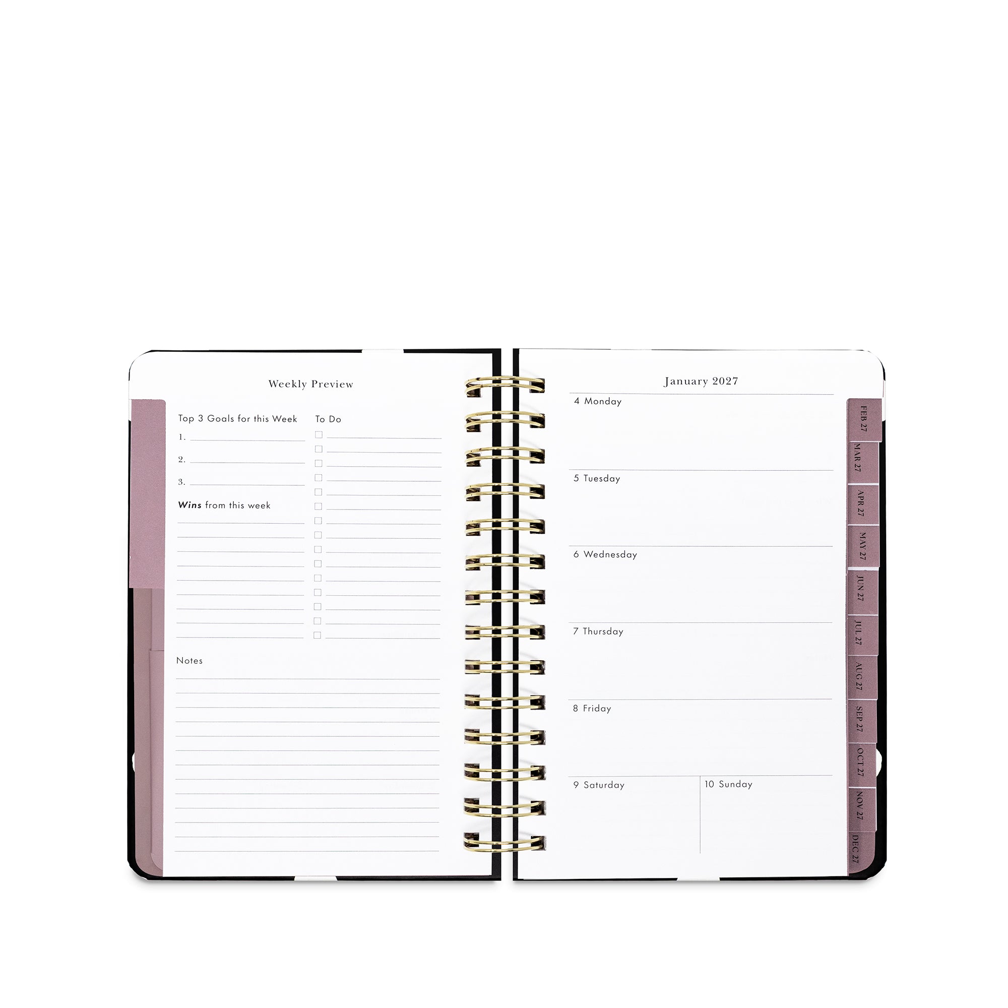 An open spiral-bound planner with white pages, gold-tone coil binding, and muted mauve-pink page headers and tabs on a plain white background.