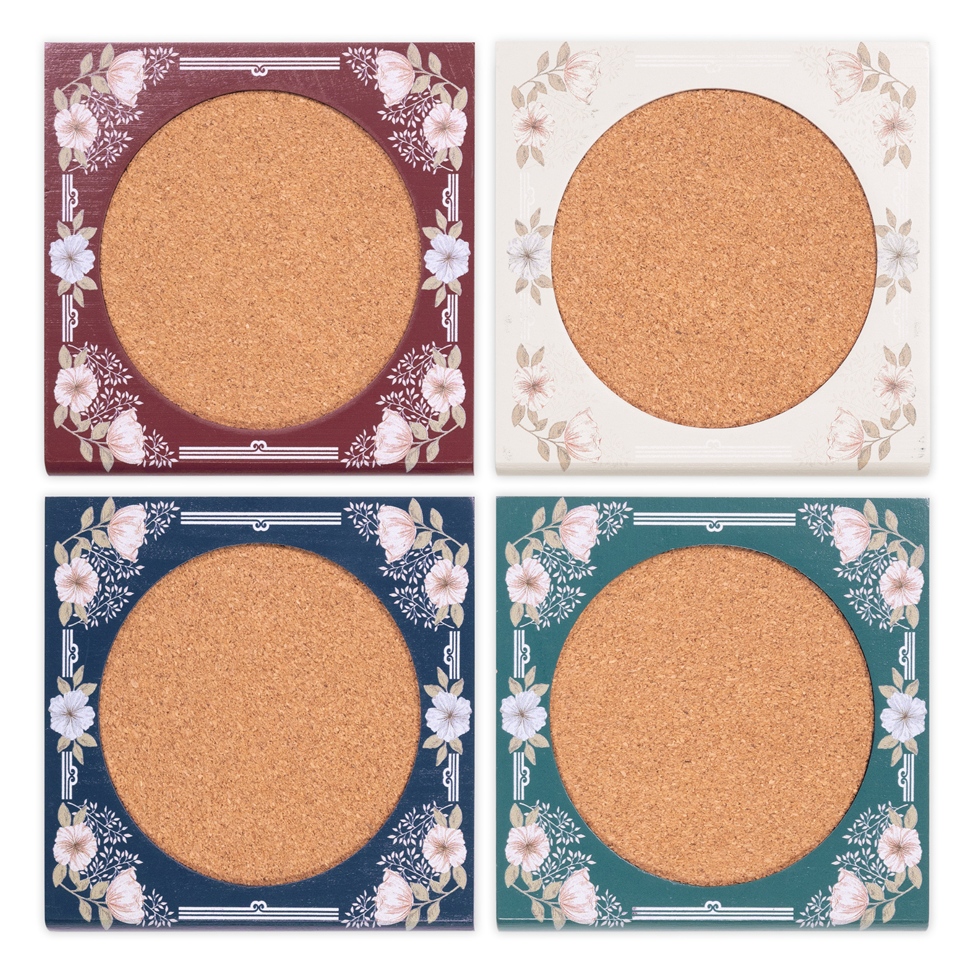 Four round coasters with floral decorative borders on a white background