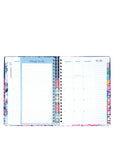 Planner with colorful floral design on a white background