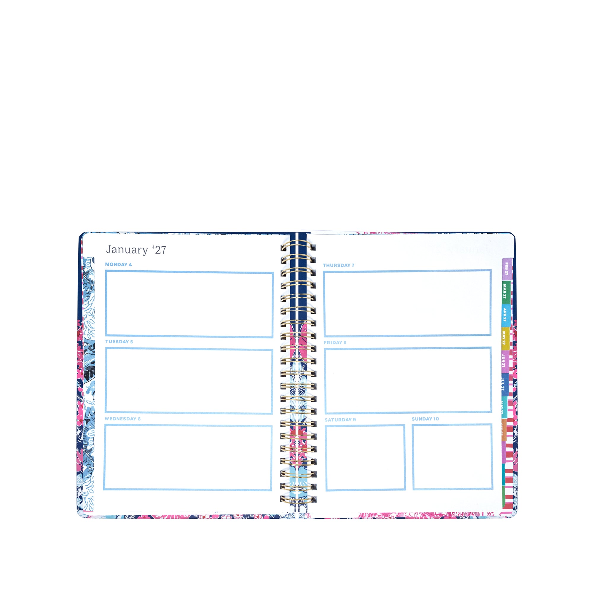 Open planner with colorful floral design on a white background
