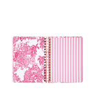 planner with pink floral and striped design on a white background