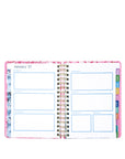 Planner with colorful tabs on a white background
