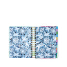Open planner with celestial design on a white background