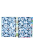 Open planner with celestial design on a white background