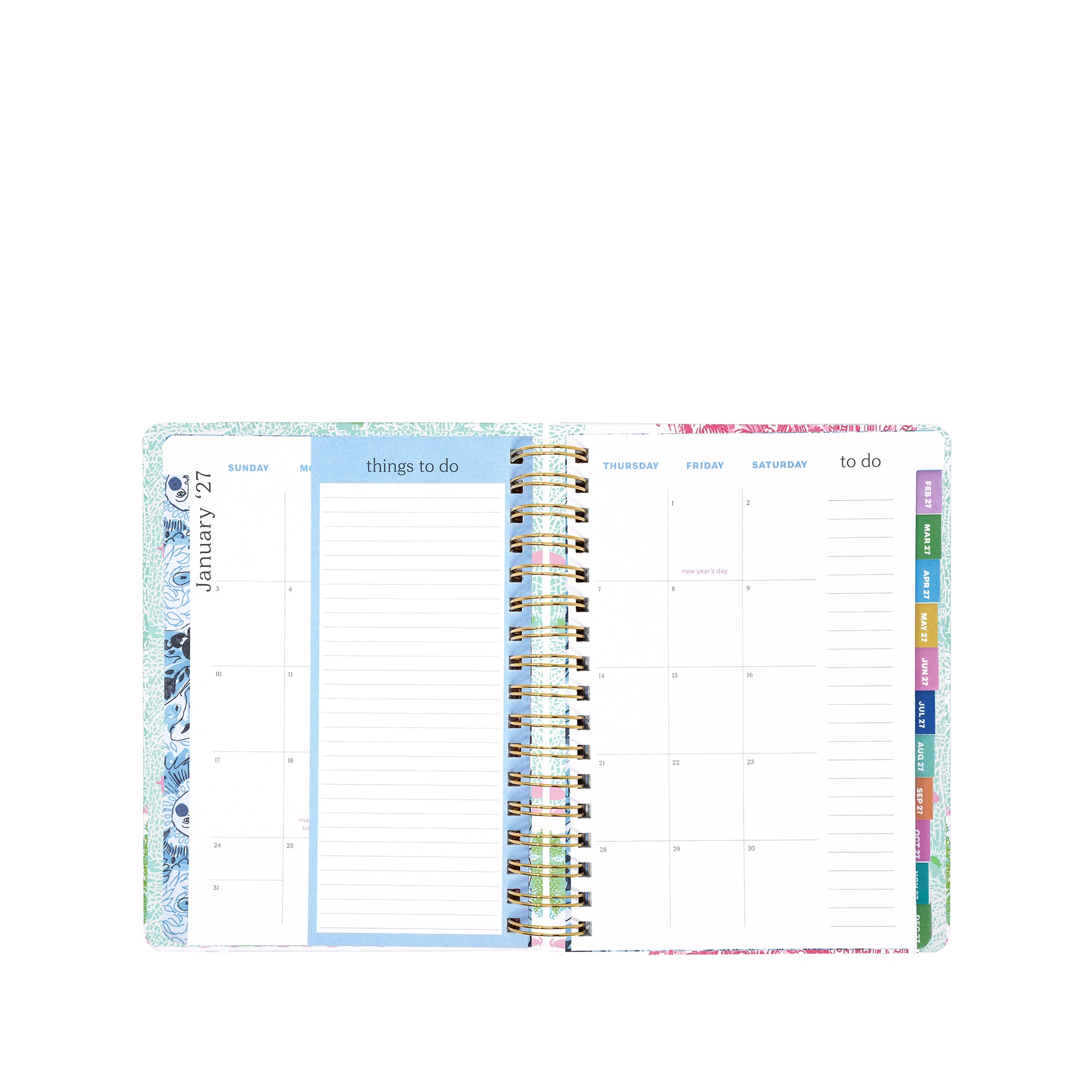 Open planner showing weekly and daily schedules with colorful tabs on a white background