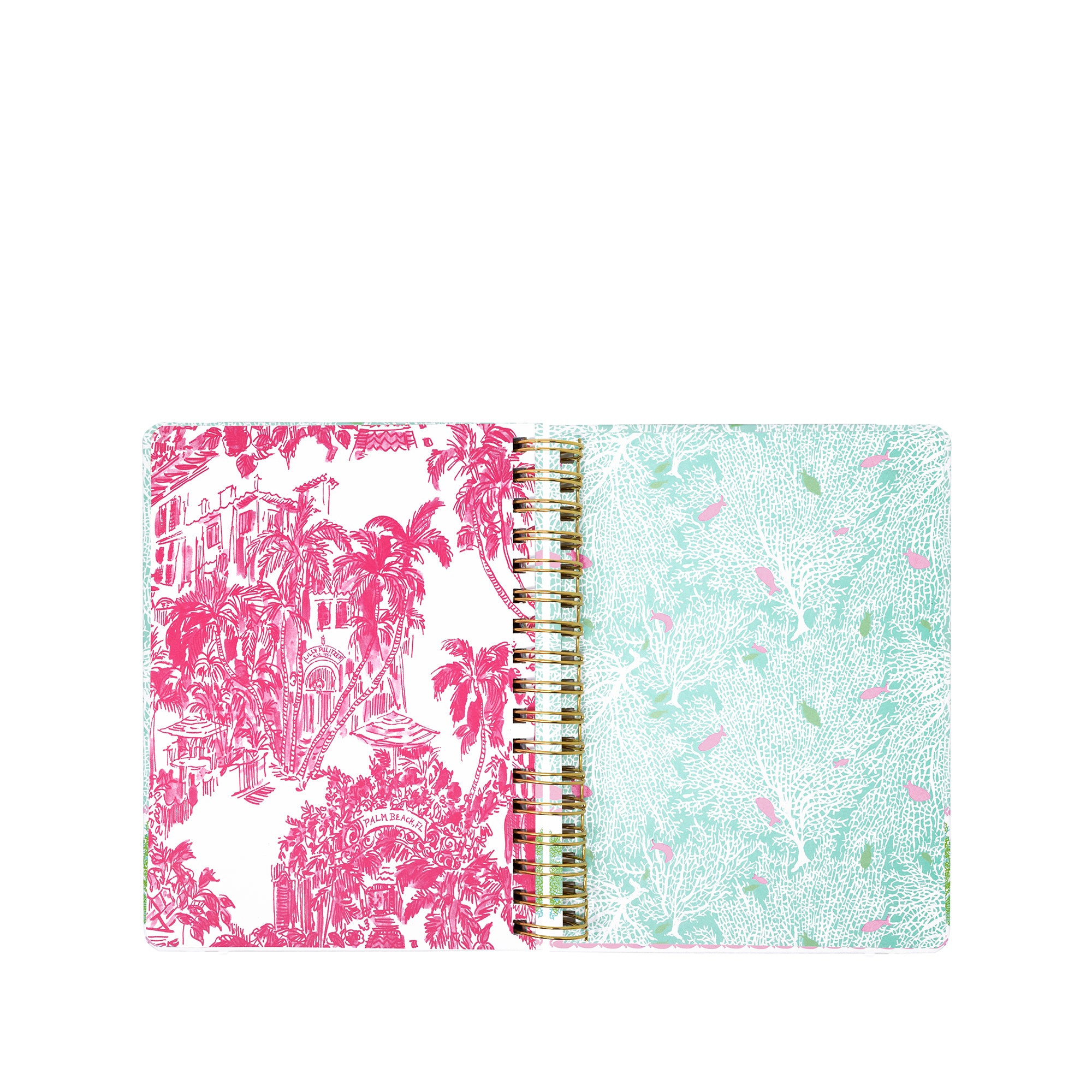 Planner with pink and white palm tree design on one cover and green and white patterned design on the other, on a white background.