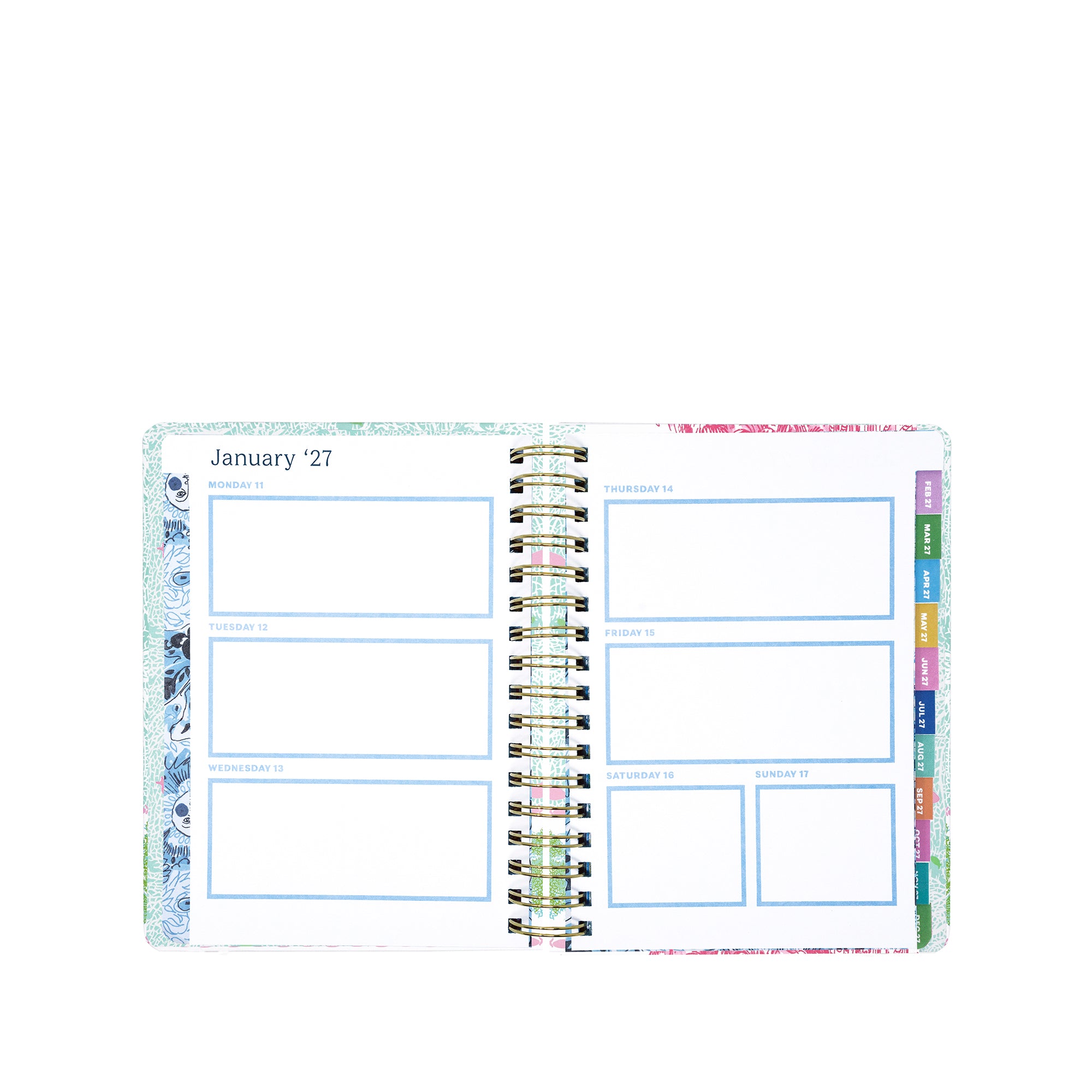 Open planner showing a monthly layout with colorful tabs on a white background