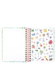 planner with colorful stickers on a white background