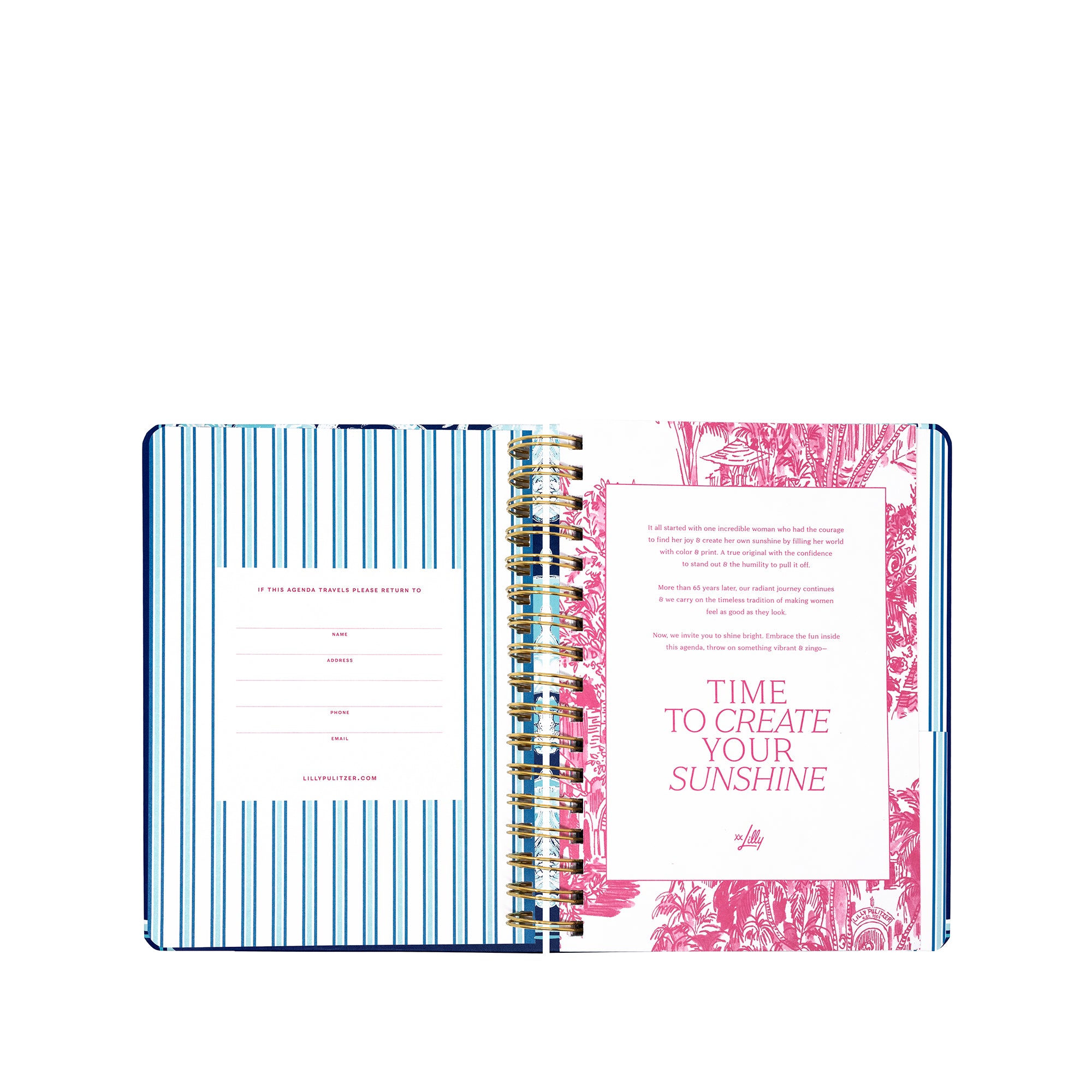 Open planner with decorative cover and interior pages on a white background