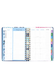 Planner with colorful tabs on a white background