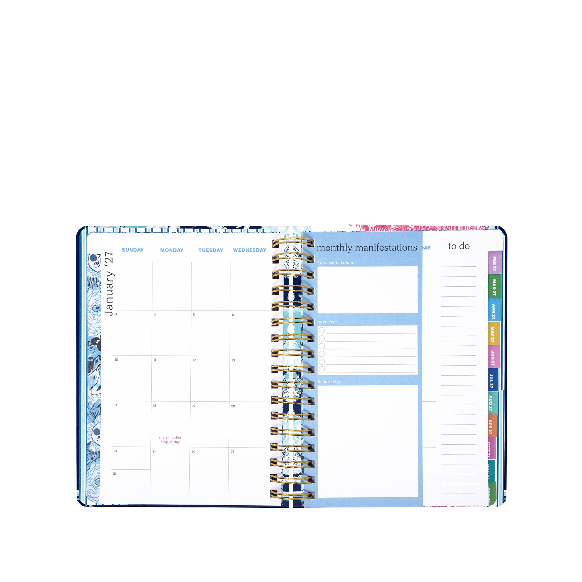 Open planner with monthly and weekly layout on a white background
