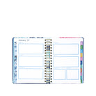 Open planner with colorful tabs on a white background