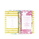 Decorative planner with yellow and pink design on a white background