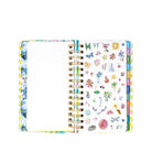 Planner with colorful stickers on a white background
