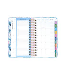 Planner with colorful tabs on a white background