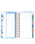 Planner with colorful tabs on a white background