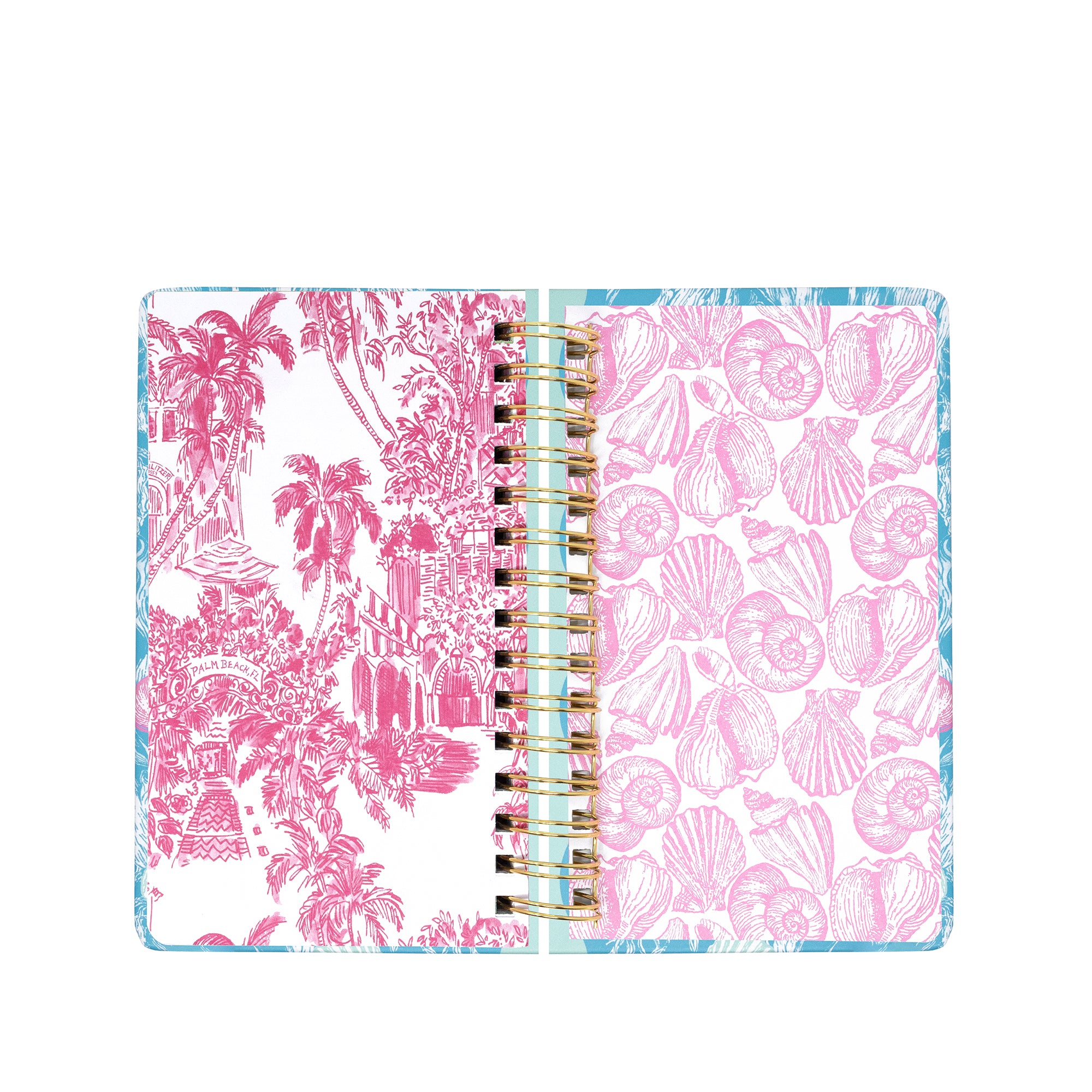 Open planner with pink floral and shell patterns on a white background