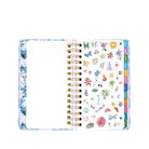 Planner with decorative stickers on a white background