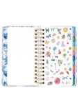 Planner with decorative stickers on a white background