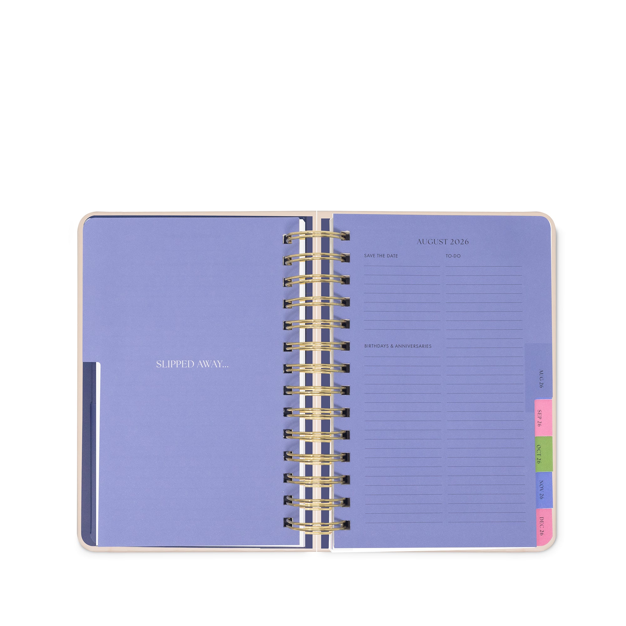 Open planner with purple cover and gold binding on a white background