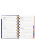 Vacation planner with colorful tabs on a white background