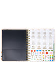 Open planner with stickers on a white background