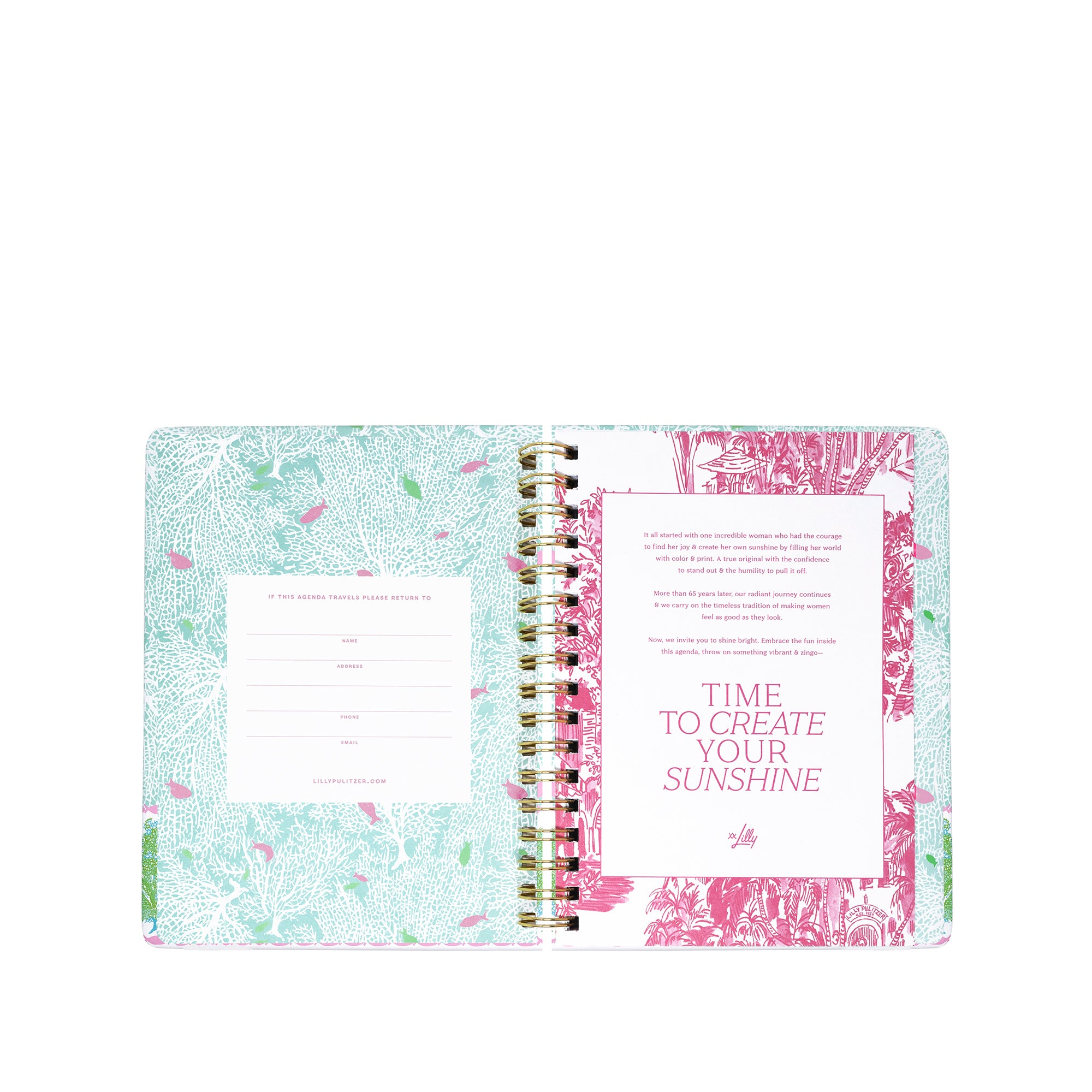 Open planner with floral design on a white background