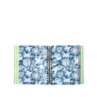 Open planner with blue floral and geometric pattern on a white background