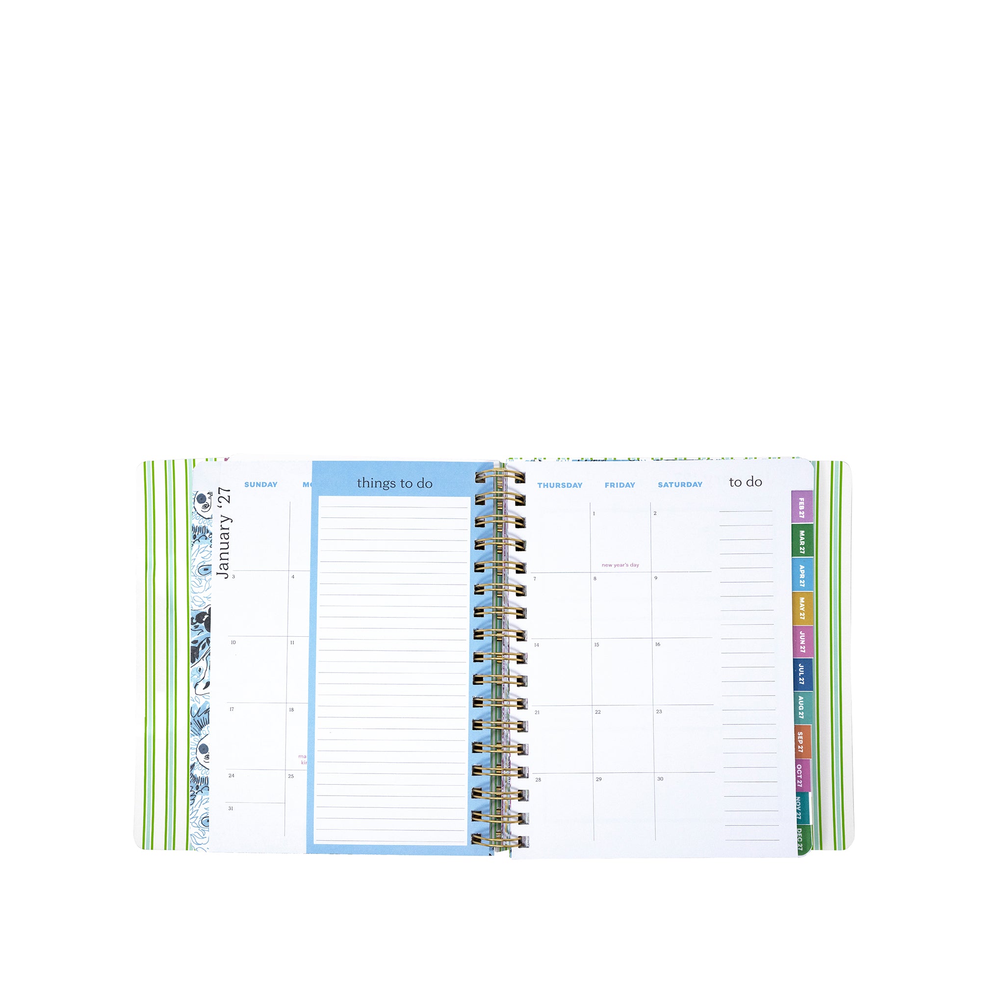 Open planner showing monthly and weekly schedules with colorful tabs on a white background