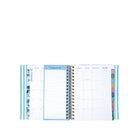 Spiral-bound planner with monthly and weekly views on a white background