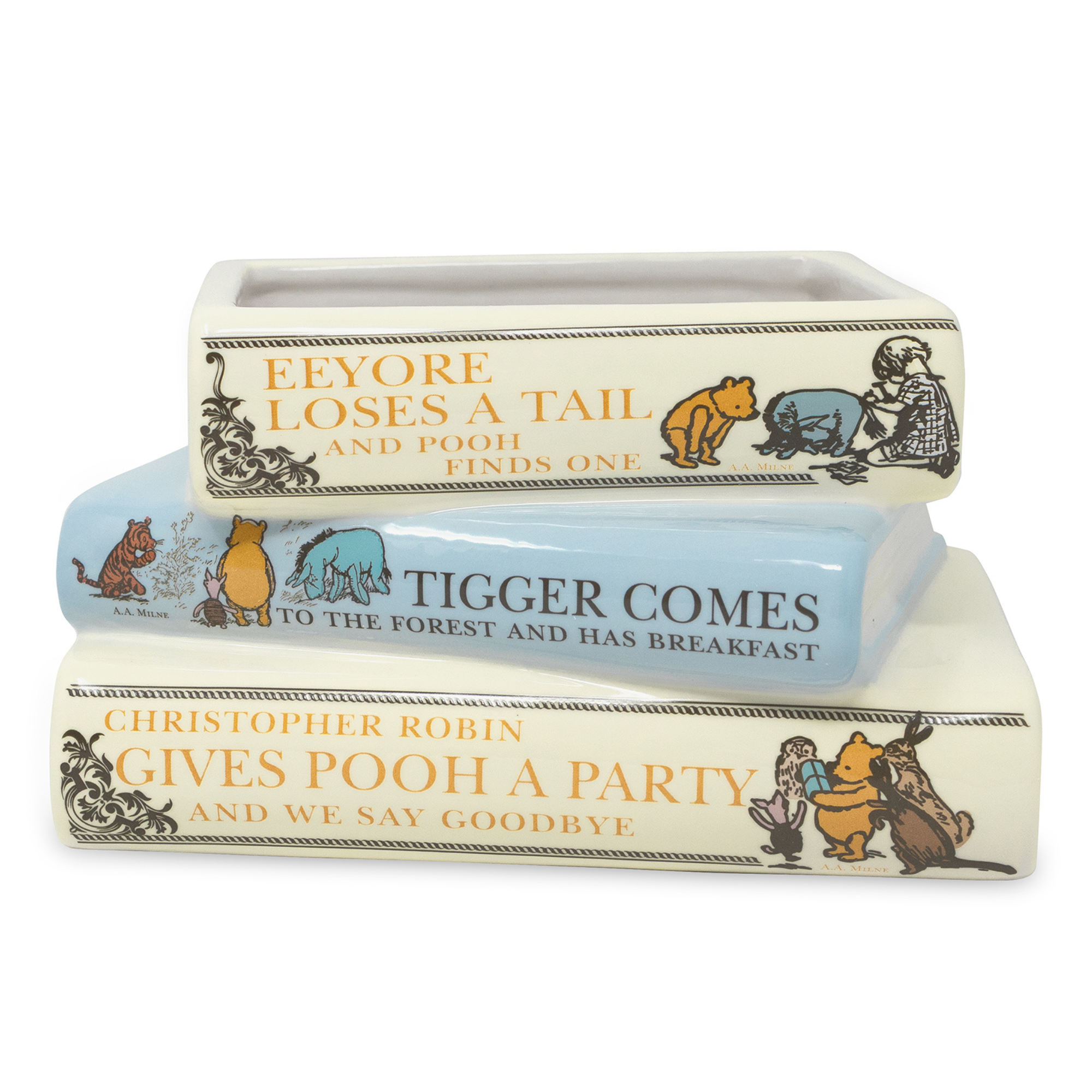 Three books stacked on top of each other with Winnie the Pooh illustrations and text.