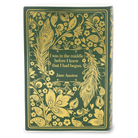 Decorative vase with gold floral and feather design on a green background