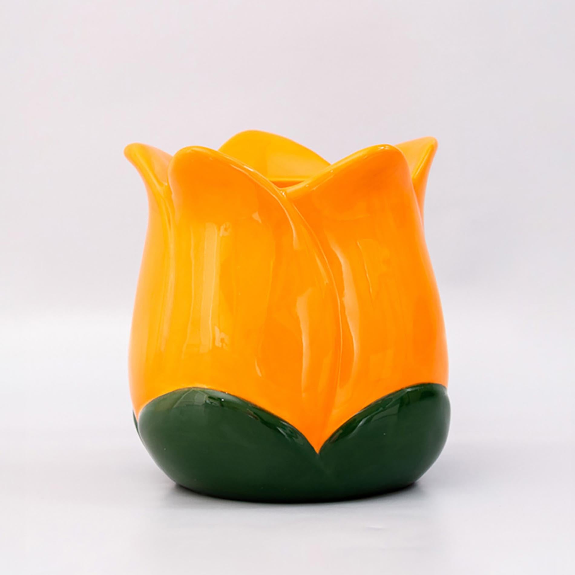 Orange and green ceramic tulip-shaped vase on a white background