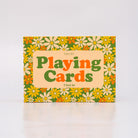 Playing cards packaging with floral design and 'bando Playing Cards' text on a white background