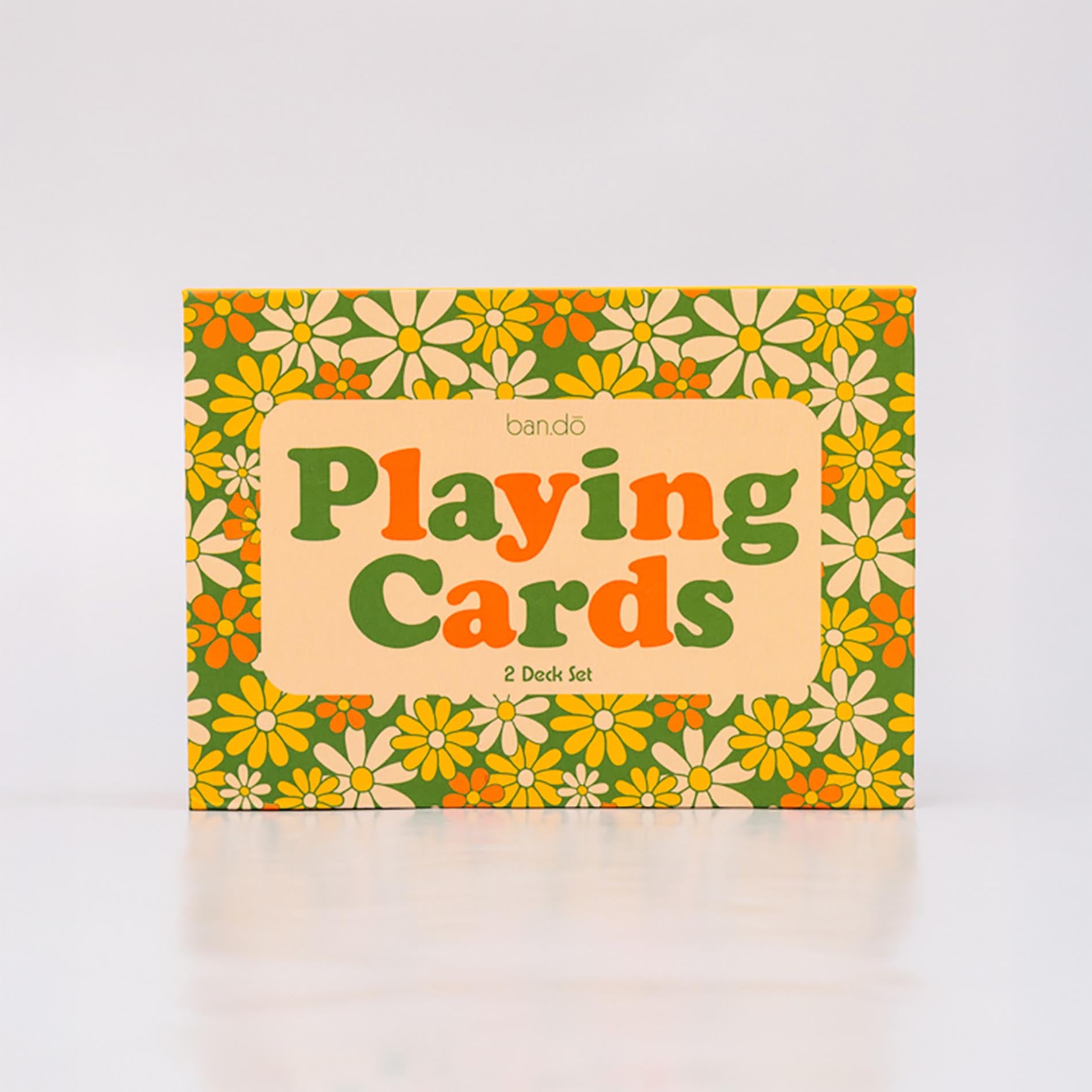 Playing cards packaging with floral design and 'bando Playing Cards' text on a white background