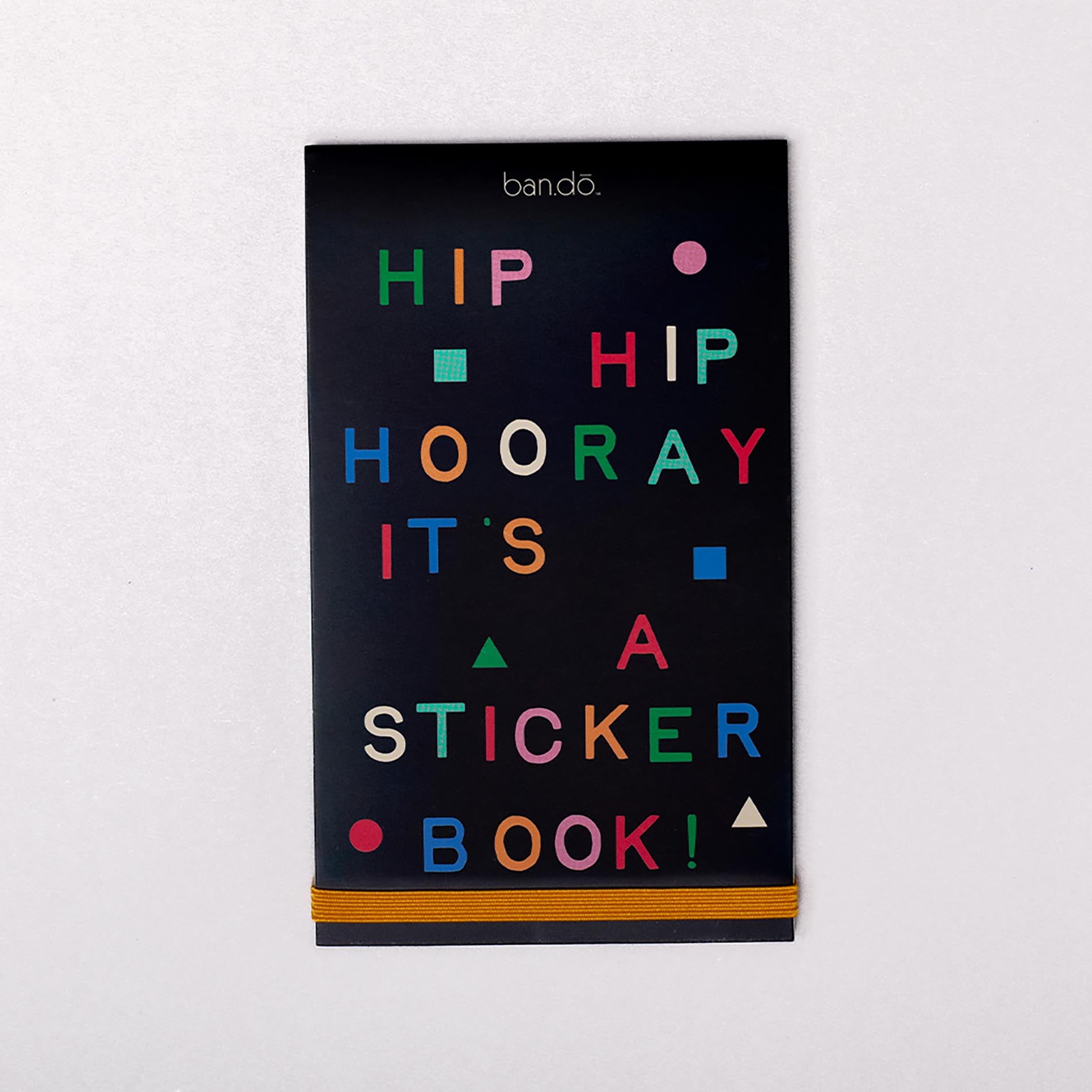 Sticker book cover with colorful text on a black background