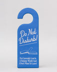 Blue door hanger bookmark with 'Do Not Disturb' text and a book illustration on a gray background
